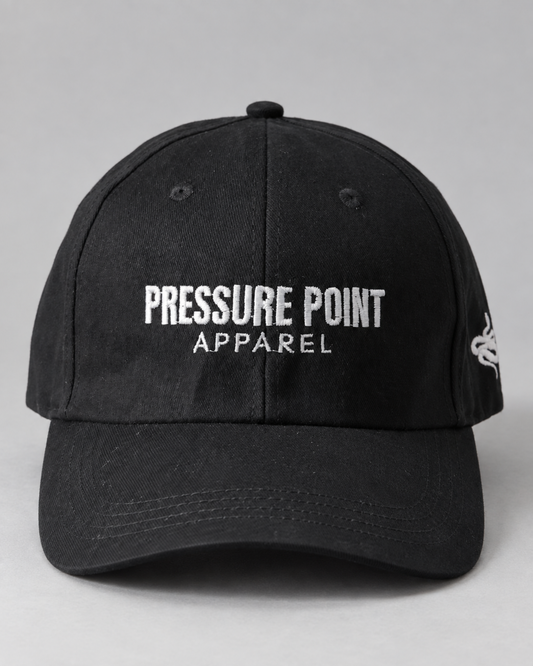 Pressure Point Embroidered Cap, front view with the Pressure Point Apparel wordmark