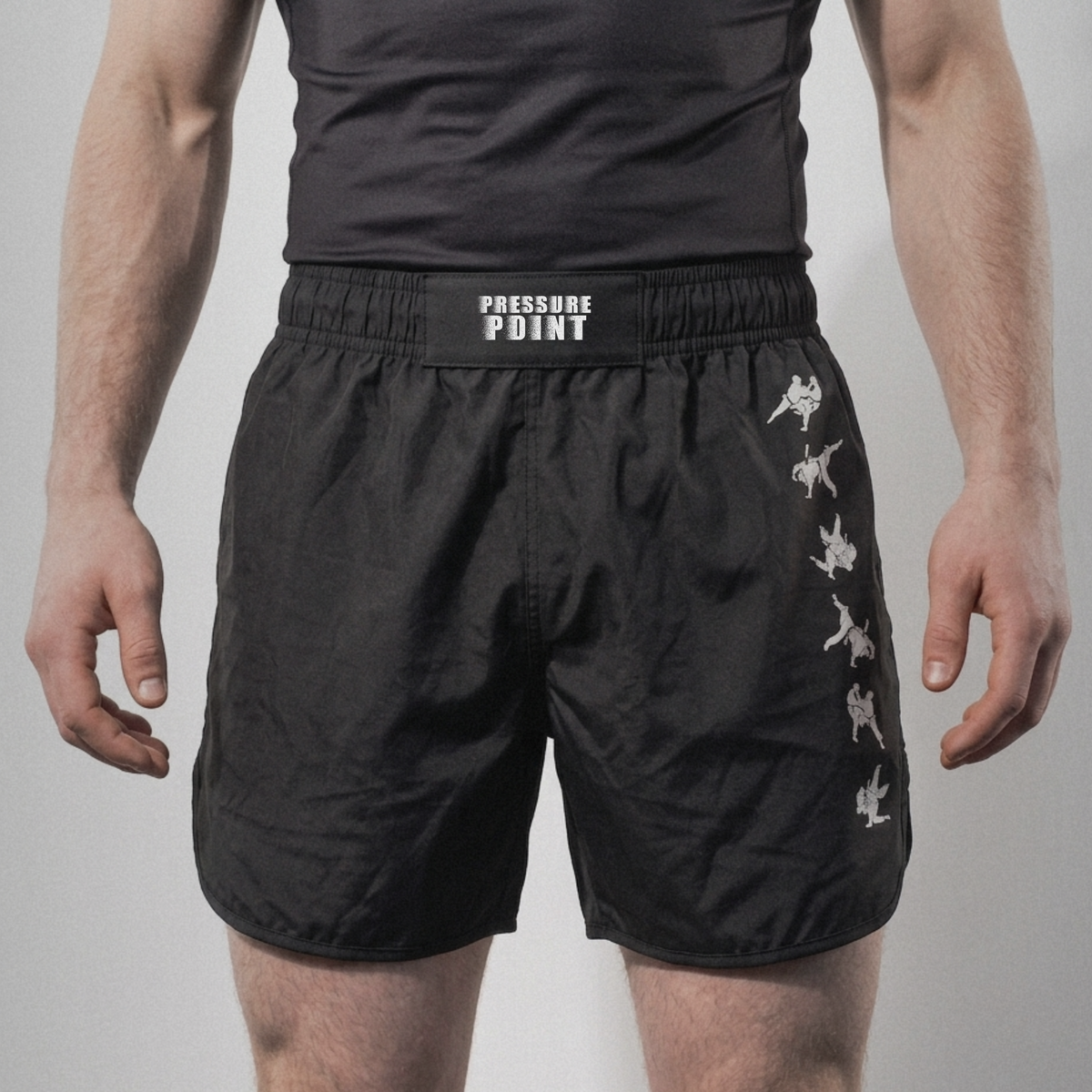 Kuzushi Fight Shorts, front view on model with the throw sequence down the leg