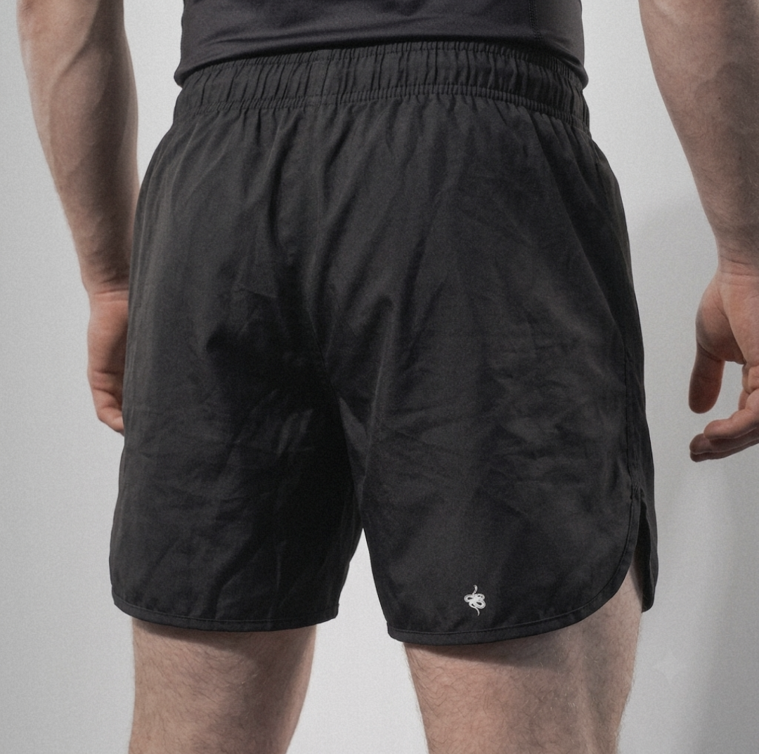 Kuzushi Fight Shorts, back view on model