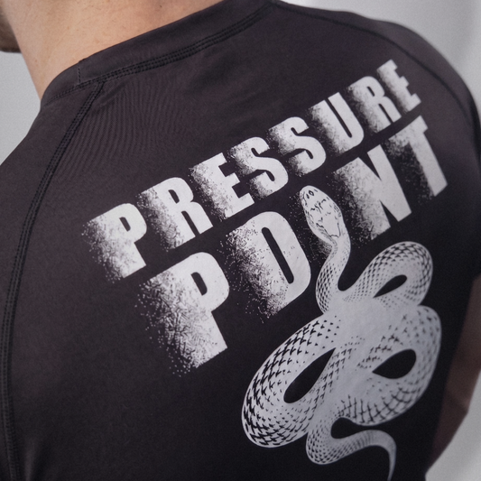Kuzushi Pulse Rashguard, close-up of the Pressure Point snake graphic on the back